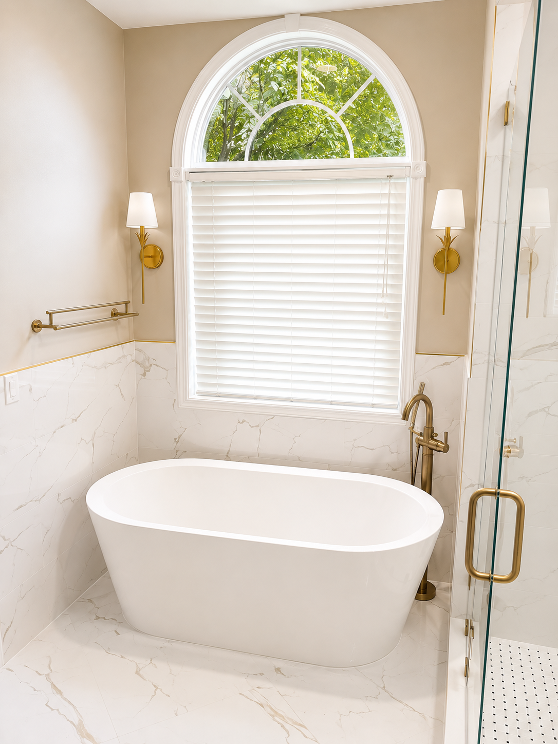 Elegant Bathroom remodel — freestanding soaking tub with arched window by Luxe Built Louisville KY