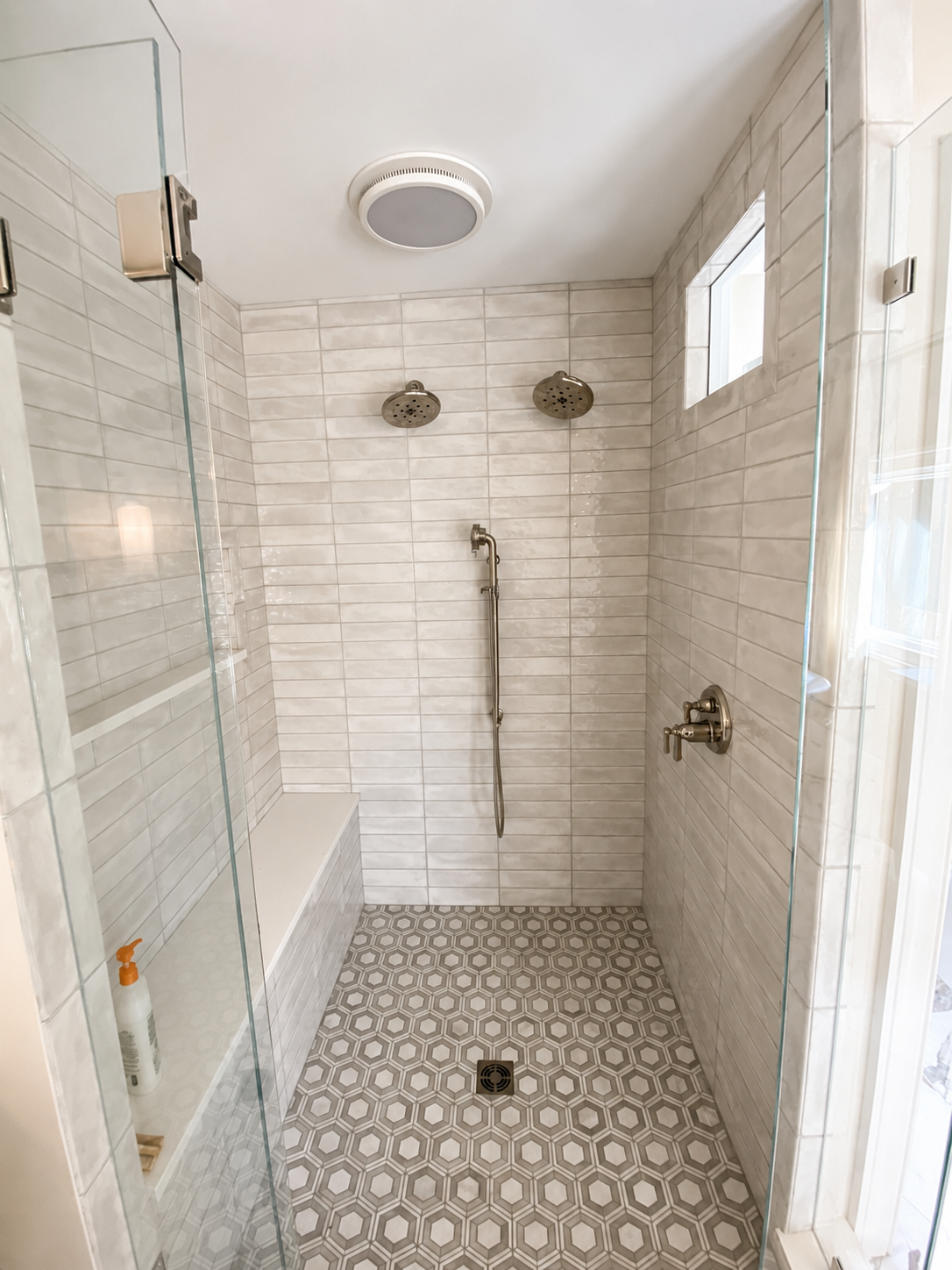 Rolling Hills bathroom — shower detail with dual rain heads and subway tile surround