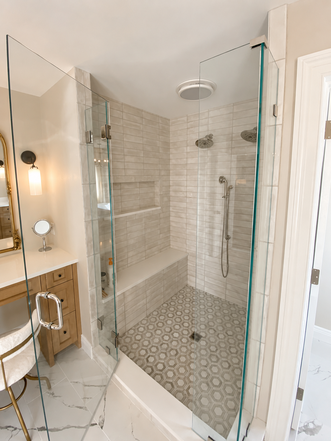 Rolling Hills bathroom — shower interior with subway tile walls, bench, and hexagon mosaic floor