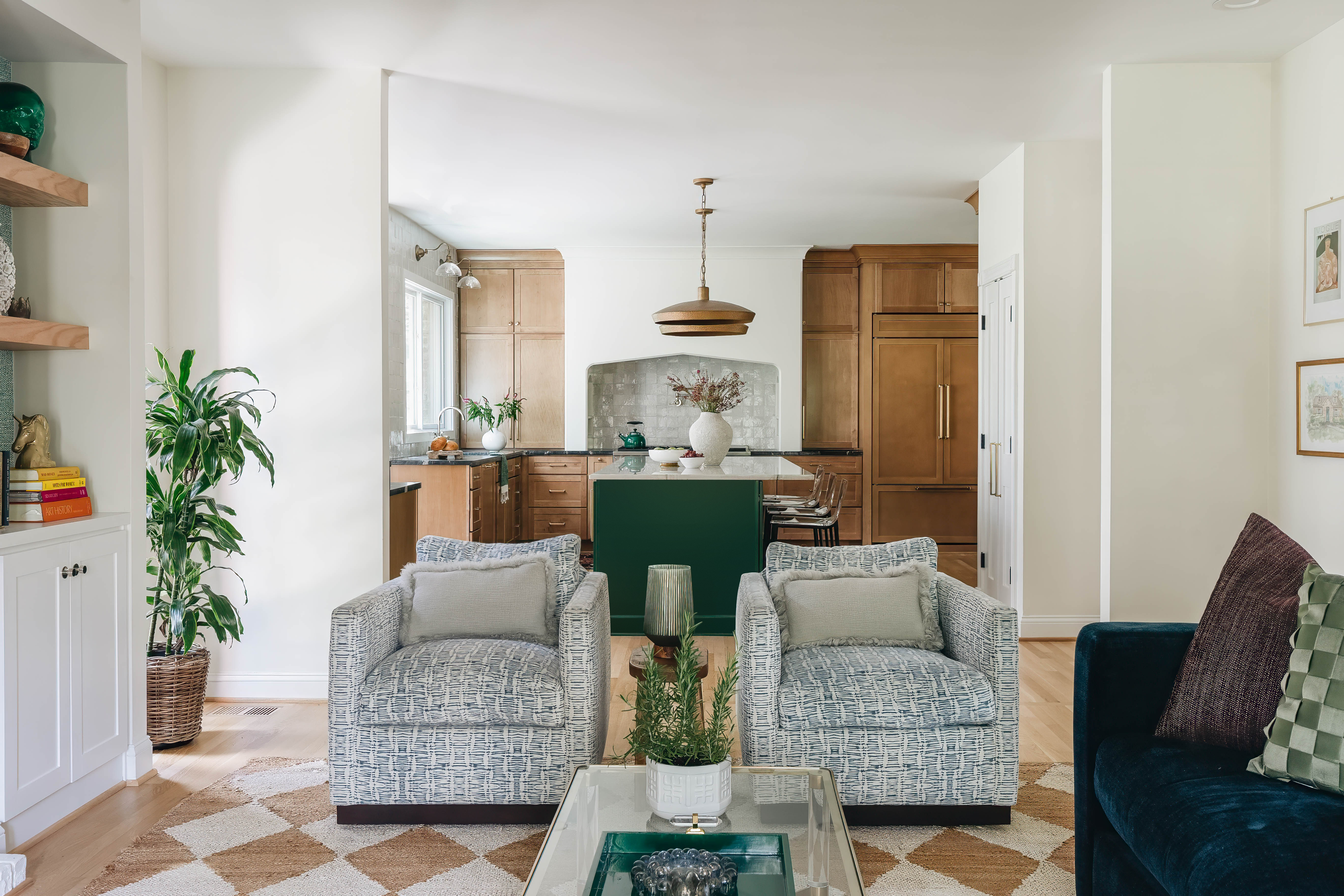 Seneca Gardens built-in detail — custom oak floating shelves with grasscloth backing and curated styling